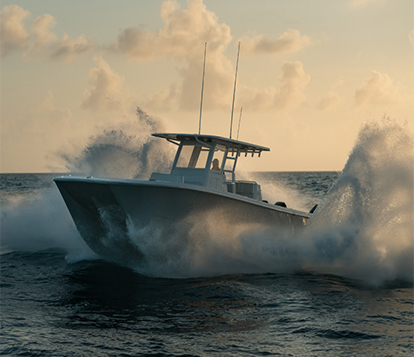 Invincible Boat's 35 foot compact catamaran speeding through waters.